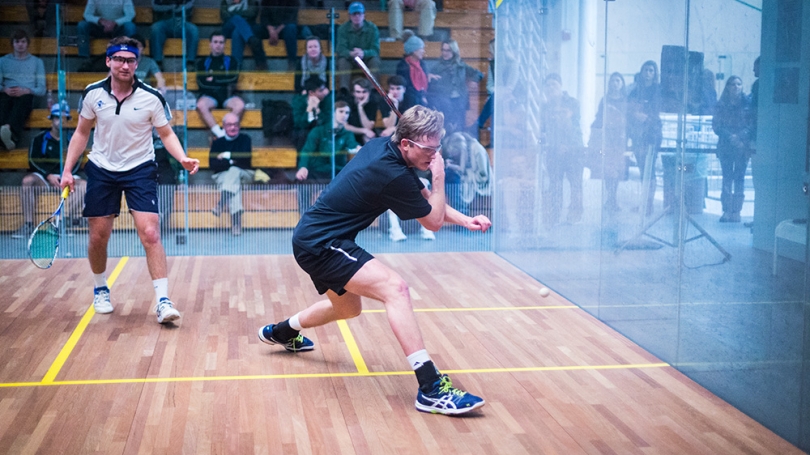 squash players play a game.